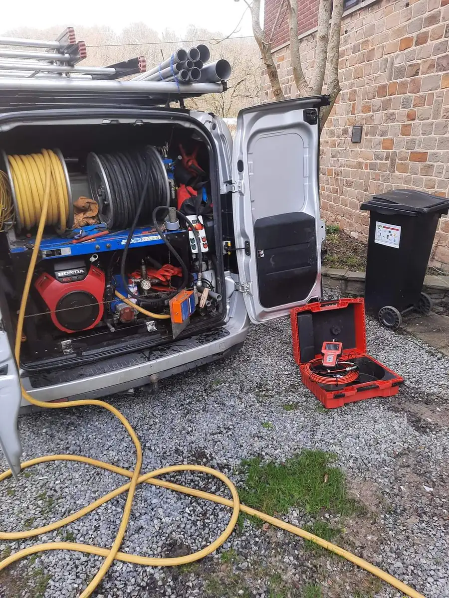 Van loaded with the high-pressure jetting unit, hose reels and camera kit